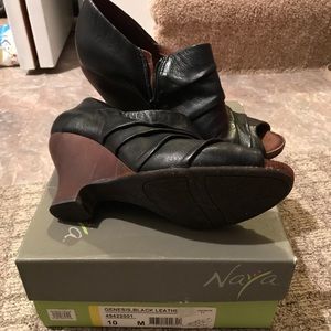 Naya black leather wedges